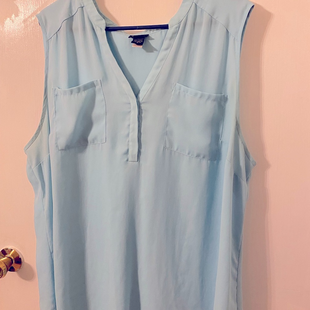 Light blue flowy Torrid sleeveless blouse